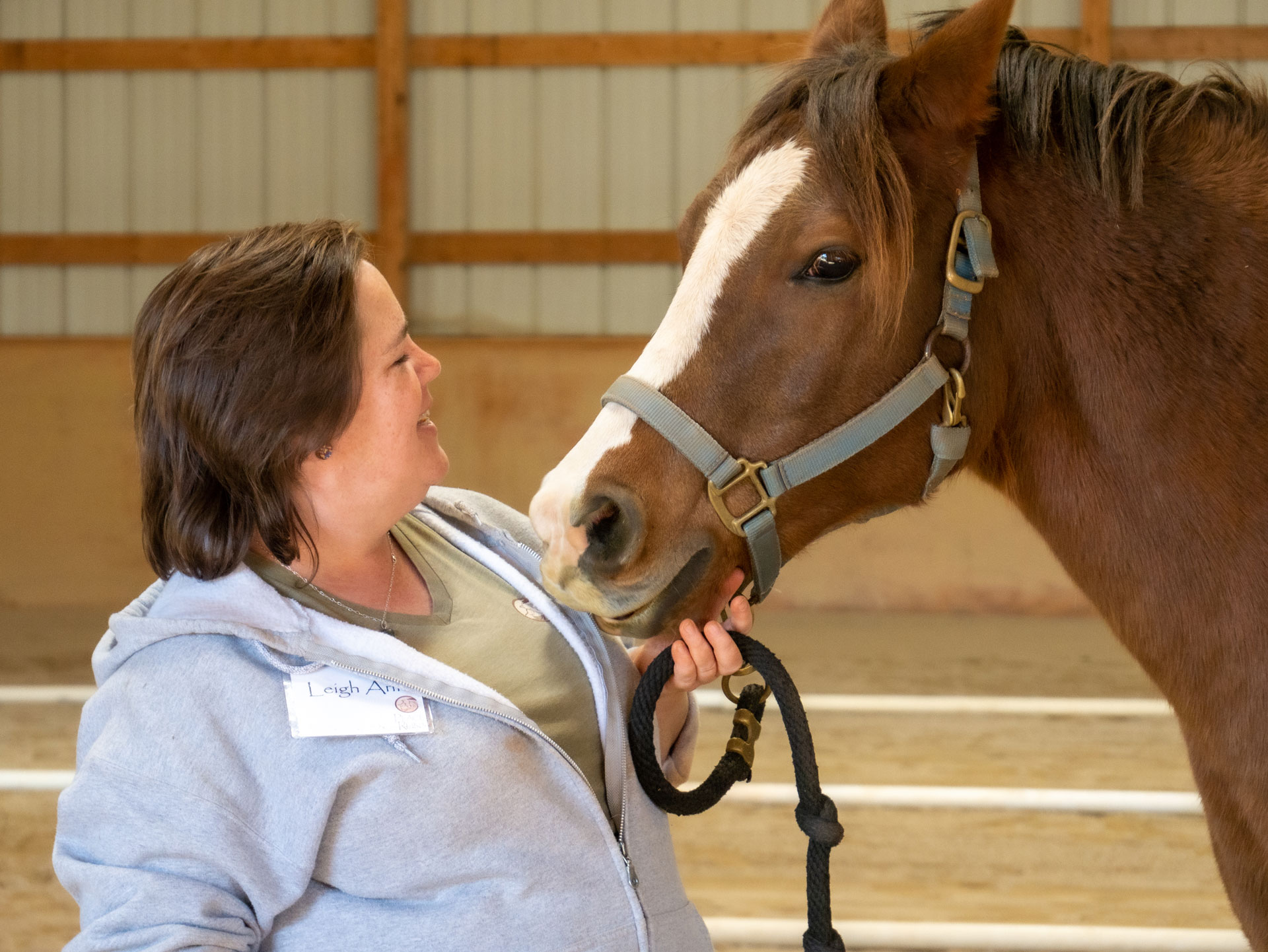 Leigh Ann Apanites with a therapy horse